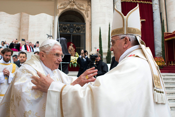 Retired Pope Benedict XVI embraces Pope Francis before the canonization Mass for SS. John XXIII and John Paul II in St. Peter’s Square at the Vatican. 