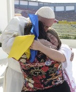 Pope Francis embraces women during a meeting with young people at Jose Maria Morelos Pavon Stadium in Morelia, Mexico, Feb. 16. (CNS photo/L'Osservatore Romano via EPA)