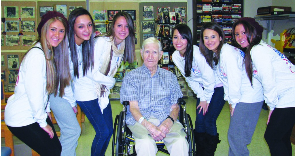 Bishop Kearney H.S. students spent time with veterans at the Armed Forces Retirement Home in Washington, D.C. Junior Alessia Giarracca is standing far left.