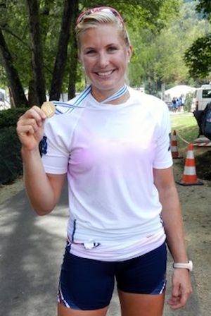 U.S. Olympian rower Meghan Musnicki proudly displays her gold medal from the 2011 World Rowing Championships in Bled, Slovenia. (Photo by Jim Mancari)