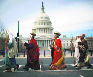 Actors dressed as Joseph and Mary and the three Wise Men, part of a live Nativity scene, stroll past the U.S. Capitol after demonstrating outside the nearby Supreme Court in Washington, D.C. on Dec. 5. Members of the Christian Defense Coalition gathered with live actors and animals to demonstrate that such displays are protected by the First Amendment. The event was a reaction to other courts involvement in the banning of Nativity scenes in some parts of the U.S. 