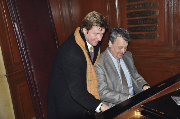 Cooney plays piano