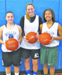 From left, Archbishop Molloy seniors Alexa Dietrich, Carolyn Gallagher and Amani Tatum will be playing basketball in college. (Photo by Jim Mancari)
