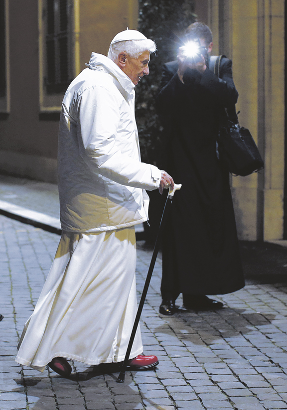 Pope Benedict XVI walks with a cane as he arrives to meet with seminarians in Rome Feb. 8. The pope announced Feb. 11 that he will resign at the end of the month. The 85-year-old pontiff said he no longer has the energy to exercise his ministry over the universal Church.