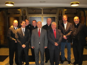 At Cathedral Prep’s Hall of Fame dinner were, from left: Tim McCleary, director of development and alumni affairs; Joseph Dibs, director of stewardship; Msgr. Kieran Harrington; Father Kevin Sweeney; Deacon Salvatore Marino; Msgr. Martin Geraghty; Charles Kutch; Steven Tuifel; and Father Fred Marano, rector-principal. (Photo by Jim Mancari)