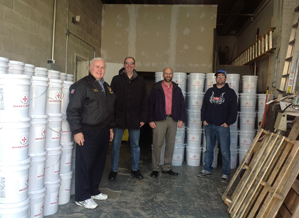 In the wake of superstorm Sandy, Knights of Columbus have been involved with the relief and recovery efforts in local communities. Above, Knights are pictured with 235 “Buckets of Hope,” five-gallon buckets full of cleaning supplies for the victims, which were donated to the N.Y.S. Knights of Columbus by the Archdiocese of Chicago. Above, Francis Boccabella, Jr., past grand knight, former district deputy and past state treasurer with brother Knights from Queens. (Photo courtesy Frederick R. Bedell Jr.)