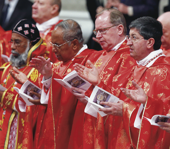 Cardinals concelebrate Mass for the election of the Roman pontiff in St. Peter’s Basilica at the Vatican March 12. Attending the service were some 170 cardinals, including 115 under 80 who later entered the conclave in the Sistine Chapel.