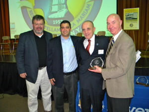 From left, Kevin McCormack, Xaverian principal; Anthony Mancusi, athletic director; Laurendi; and Robert Alesi, president, pose after Laurendi’s induction. (Photo by Jim Mancari)
