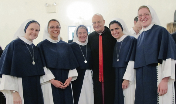 Bishop Gregory Mansour welcomes members of the Sisters of Life.