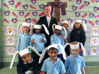 Sister Roberta with kindergartners at Our Lady of the Snows (Photo by Jim Mancari)