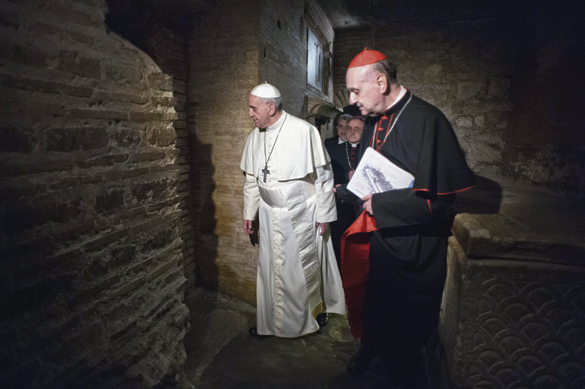 Pope Francis visits the excavated necropolis below St. Peter’s Basilica at the Vatican April 1. The necropolis is where St. Peter’s tomb has been venerated since early Christian times and where the first church dedicated to him was built. The tomb is two levels below the main altar of the modern basilica.
