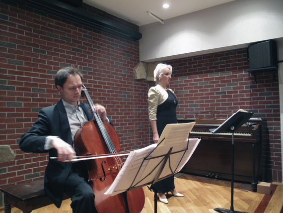Jan Roszkowski and Malgorzata Kellis perform for at St. Rose of Lima, Parkville, in an effort to help those in attendance gain a better understanding of God. 