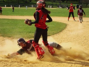 Elizabeth Texeira slides in safely at home (Photo courtesy St. Saviour H.S.)