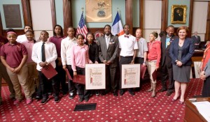 Council Member Jumaane D. Williams presents official New York City proclamations at City Hall to the boys and girls basketball teams of Nazareth Regional High School in recognition of their CHSAA Class A city and state championships; he is joined by Council Member Andy King, Council Speaker Christine C. Quinn (right) and other council members. (Photo by William Alatriste/NYC Council)