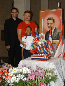 Father Da Costa with Ana Felipe and David Smith.