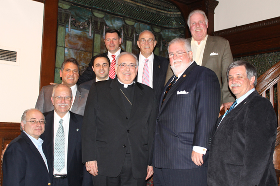 Officers and members of the board of The Cathedral Club of Brooklyn visited Bishop Nicholas DiMarzio at his residence and presented him with a check for $100,000.