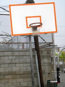The outdoor basketball courts at St. Francis de Sales, Belle Harbor, suffered extensive damage in Hurricane Sandy, including crooked hoops. (Photo by Jim Mancari)