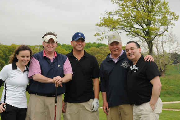 From right, Futures in Education Director of Development Nicholas Vendikos and DeSales Media CEO Art Dignam with golfers.