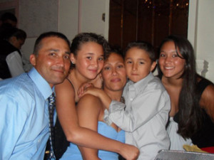 In happier times, the Malave family of College Point, from left, Carlos, Alyssa, Hilda, Cristian and Melissa. The family has received an outpouring of support following a March 30 car accident, which claimed the life of Cristian, 11, and seriously injured his parents and siblings. Photo courtesy Daniel Rinaldi