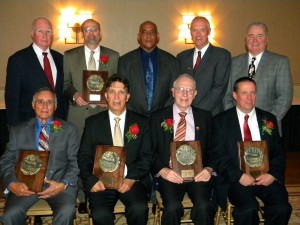 The CHSAA Hall of Fame Class of 2013 includes, top row from left: Tom Murray, CHSAA President N.Y.C./Bronx; James Carey, Msgr. McClancy; Harry Hart, Power Memorial/Blessed Sacrament; Jim O’Brien, St. Francis Prep; and Ray Nash, CHSAA President Brooklyn/Queens. Seated from left: Frank Cardascia, Football/Basketball Official; Lou Piccola, Xaverian; Connie Meibauer, Msgr. Farrell; and Kevin O’Meara, Holy Cross/Iona Prep. (Photo by Jim Mancari)