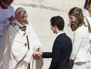 Pope Francis greets newly confirmed young people as they bring up the offertory gifts during a Mass in St. Peter’s Square at the Vatican April 28. The pope confirmed 44 people from 22 countries. Photo © Catholic News Service