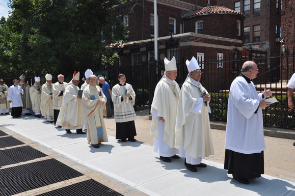 Bishop Sullivan processses with Auxiliary Bishop Guy Sansaricq outside Our Lady of Angels, Bay Ridge.