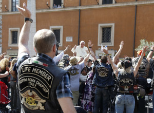 Pope greets Harley-Davidson riders before Mass at Vatican
