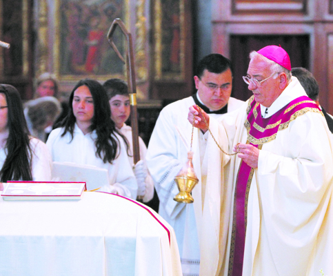 Bishop Nicholas DiMarzio uses incense during funeral Mass for retired Auxiliary Bishop Joseph M. Sullivan of Brooklyn, N.Y.