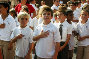  The opening Mass of the new academic year at St. Mel School, Flushing, coincided with the parish observance of the 9/11 terrorist attacks. Children attended Mass, released balloons in the victims’ memories and put their hands over their hearts for the national anthem. (Photo by Marie Elena Giossi)