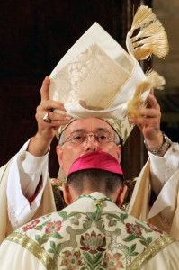 BROOKLYN BISHOP PLACES MITER ON HEAD OF AUXILIARY DURING ORDINATION