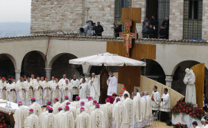 Pope Francis celebrates Mass in the piazza outside the Basilica of St. Francis in Assisi, Italy, Oct. 4. The pontiff was making his first pilgrimage as pope to the birthplace of his papal namesake. (CNS photo/Paul Haring)