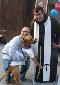 Animals around the diocese received special blessings in honor of the Oct. 4 feast of St. Francis of Assisi, patron of animals. Franciscan Father Brian Jordan, O.S.F., held the first animal blessing at St. Francis College, Brooklyn Heights, where he sprinkled holy water on Robert Oliva’s dog Amstel. (Photo by Marie Elena Giossi)
