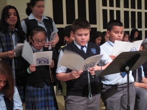Rosaries in hand, students representing seven Catholic schools in the diocese prayed the rosary and sang hymns to Mary with their peers and Bishop Sansaricq on a recent morning at St. James Cathedral-Basilica. The month of October is dedicated to Mary and the holy rosary.