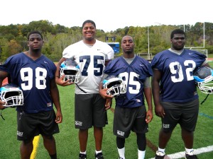Four former CHSFL standouts are now playing at Southern Connecticut State University in New Haven, Conn. Pictured from left are: redshirt freshman defensive tackle Justin Reid, freshman offensive tackle Terrence Brown, sophomore cornerback Chavez Rose and freshman defensive tackle Oladimeji Bamishile. (Photo by Jim Mancari)
