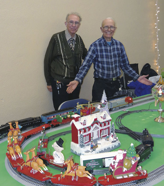 Robert and Arthur Miller with the train set.