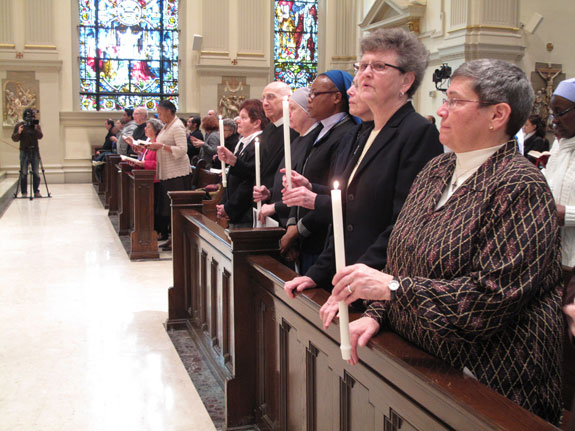 Men and women religious participate in the liturgy for the World Day for Consecrated Life at St. James Cathedral-Basilica.