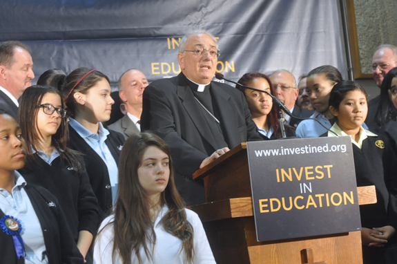 Bishop Nicholas DiMarzio speaks at a press conference in Manhattan that brought together religious and labor leaders to  show broad support for the proposed Education Investment Tax Credit legislation before the State Legislature and governor. Cardinal Timothy Dolan is at upper right.