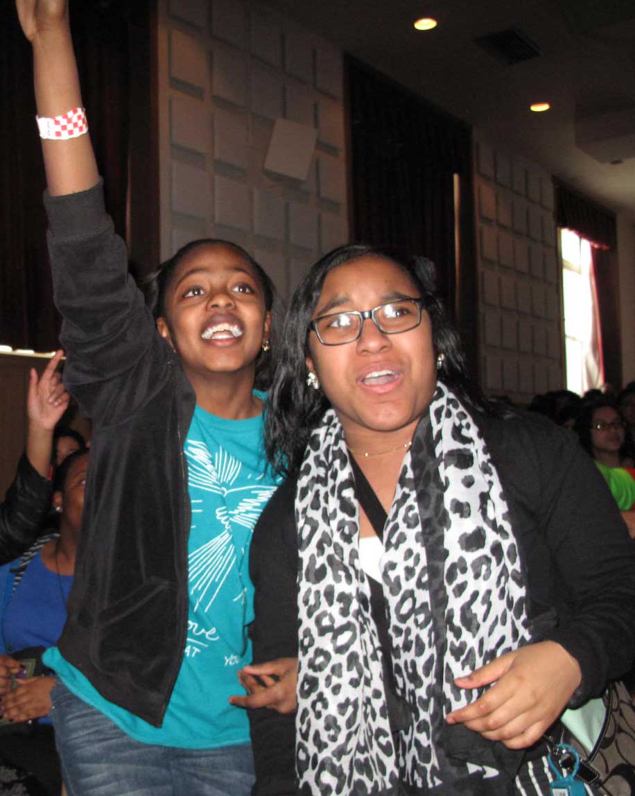 Local high schoolers cheer during an icebreaker at the 2014 Diocesan Youth Day, which took place at the Immaculate Conception Center, Douglaston. There was barely enough room in the chapel to accommodate all the teens that showed up this year. 