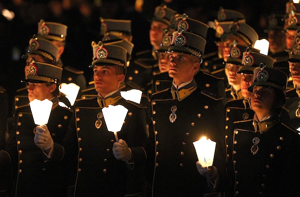 Military personnel hold candles during a candlelight vigil involving the militaries of 36 nations at the Shrine of Our Lady of Lourdes in southwestern France May 17. About 60 wounded U.S. military personnel, together with family members and caregivers, were a part of the annual International Military Pilgrimage to Lourdes.