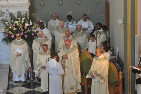 bishop and priests in sanctuiary