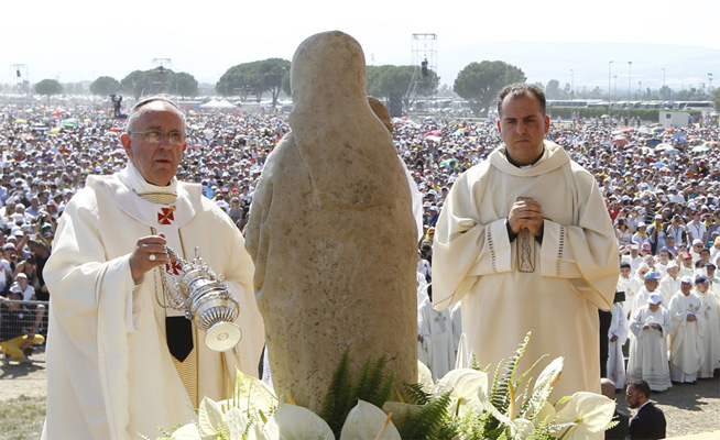 Pope Francis uses incense as he celebrates a Mass attended by 250,000 people in Sibari, in Italy’s Calabria region, June 21. During his homily, the pope said “mafiosi” are not in communion with God and are excommunicated. 