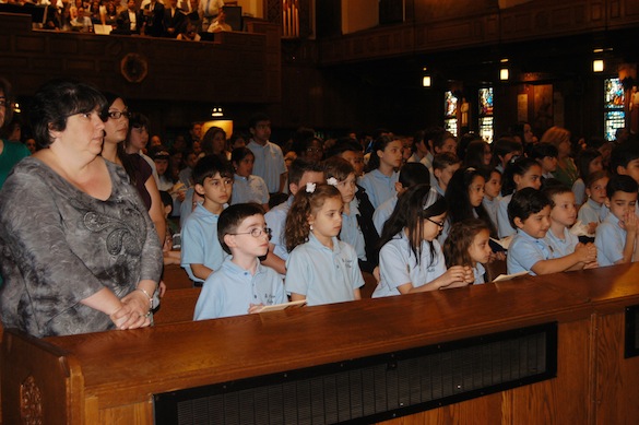 Parish schoolchildren attended the closing liturgy of the centennial year (Photo by Marie Elena Giossi)