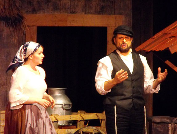 Monica Barczak, left, of Our Lady of Hope parish, Middle Village, performs with Andrew Koslosky in “Fiddler on the Roof” at the ICC Theater.