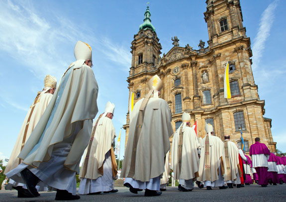 Bavarian bishops walk in procession to the Basilica of the Fourteen Holy Helpers near Bad Staffelstein, Germany.