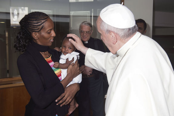 Pope Francis blesses Meriam Ibrahim of Sudan and her baby during a private meeting at the Vatican.