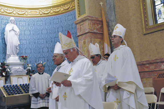 The auxiliary bishops of the diocese participate in the liturgy.