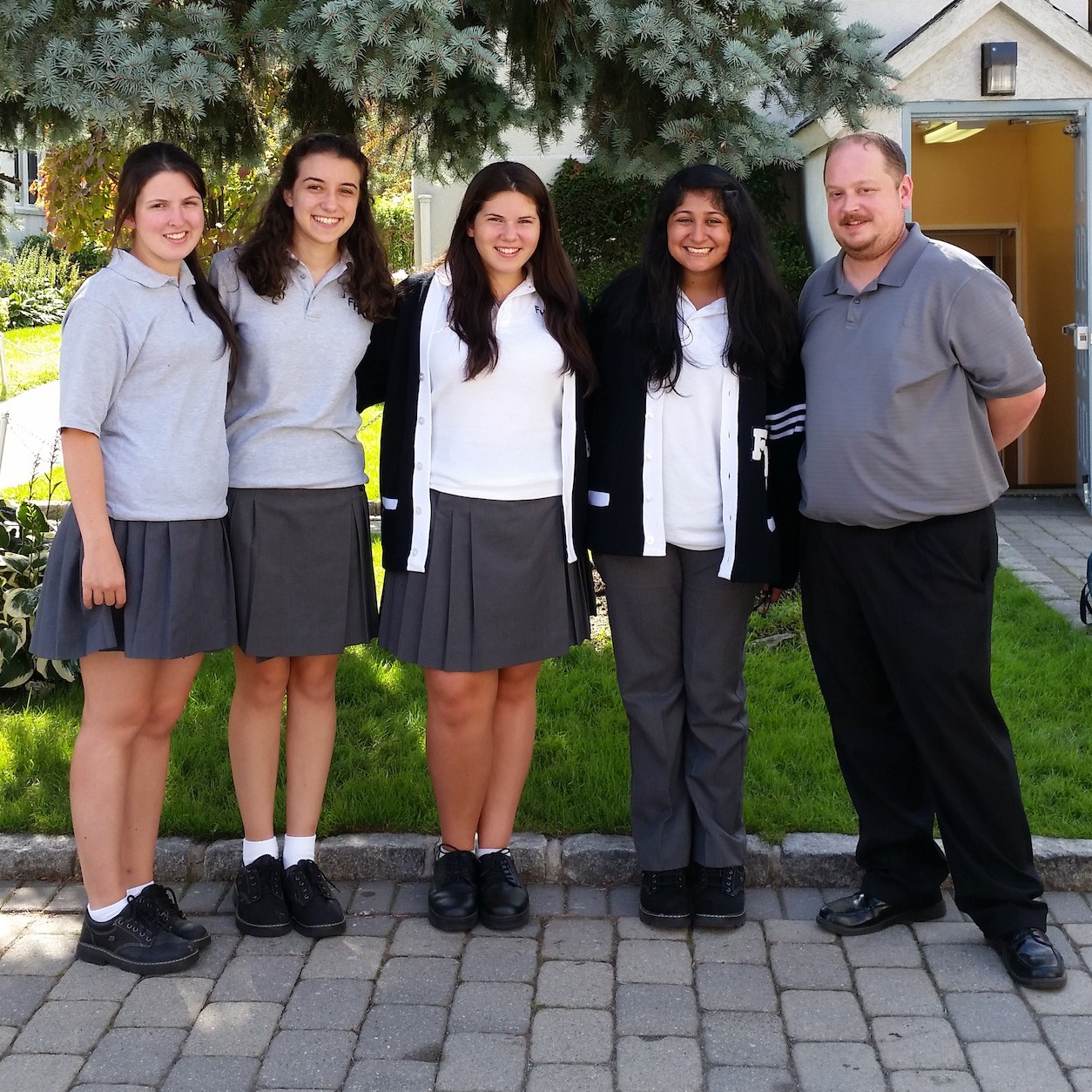 Pictured are Fontbonne students who participated in the Cyber Security Program and Mark Surdyka, Fontbonne’s director of technology. 