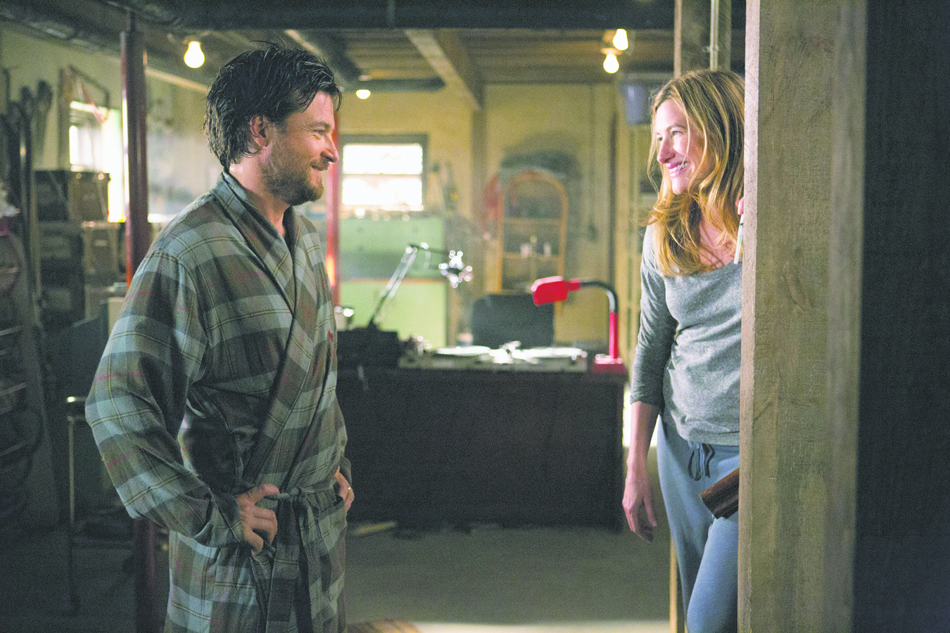 Jason Bateman and Annie Altman star in a scene from the movie “This Is Where I Leave You.” 