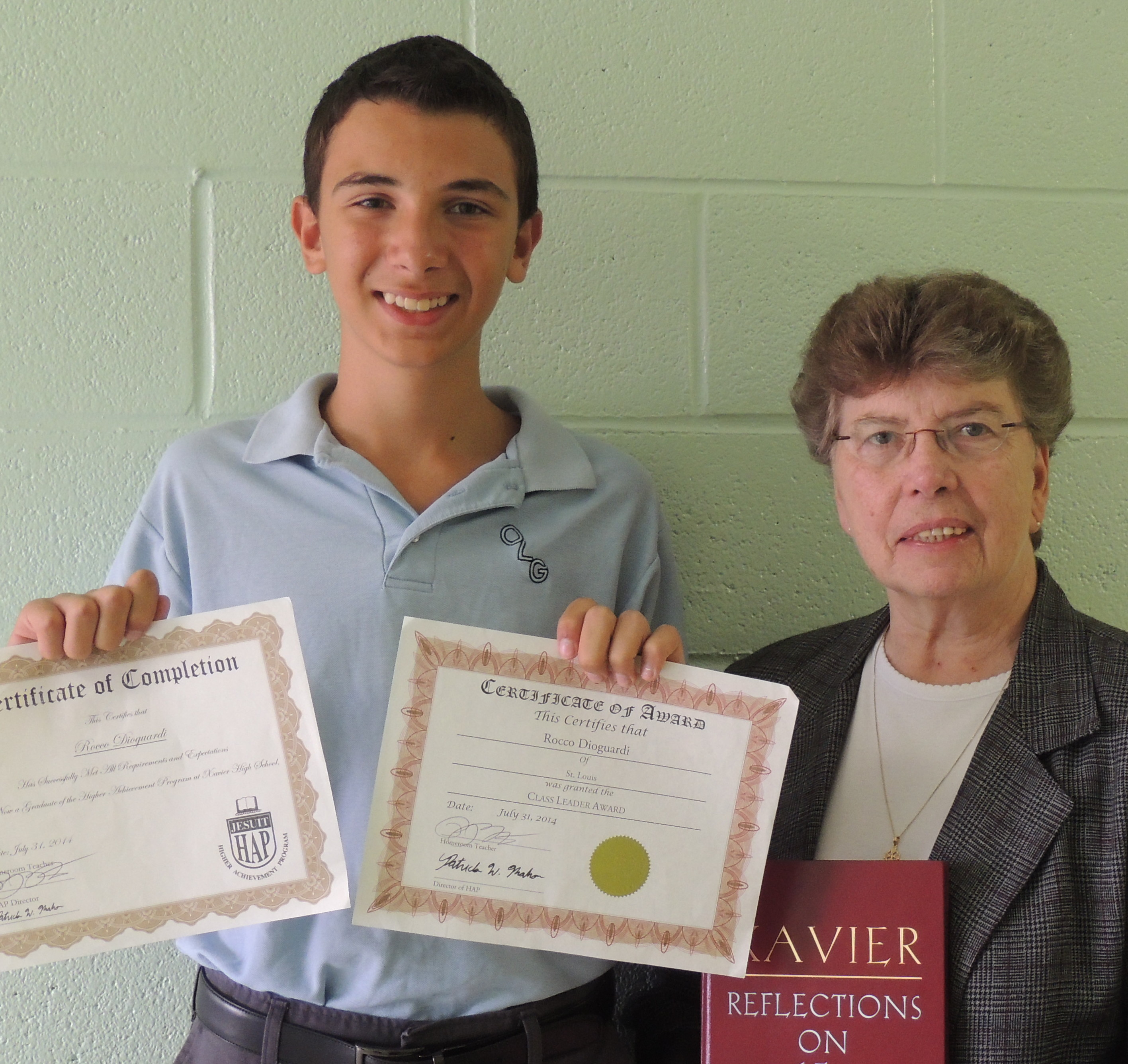 Dioguardi poses with his principal at Our Lady of Guadalupe, Sister Dolores F. Crepeau, C.S.J.