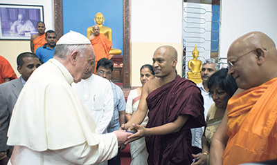 Pope Francis greets Buddhist monks in Colombo, Sri Lanka